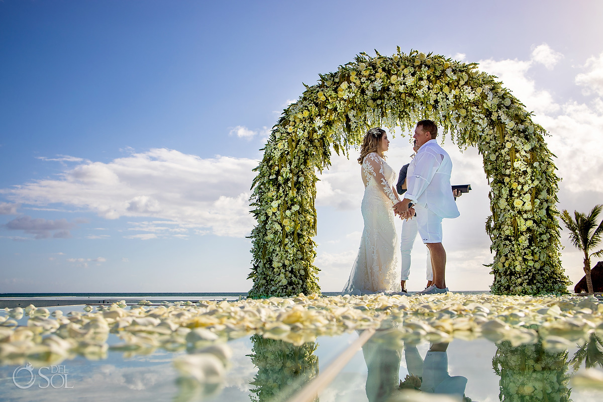 Dreams Natura Wedding Ceremony Infinity Pool flower arch Riviera Cancun Mexico #travelforlove