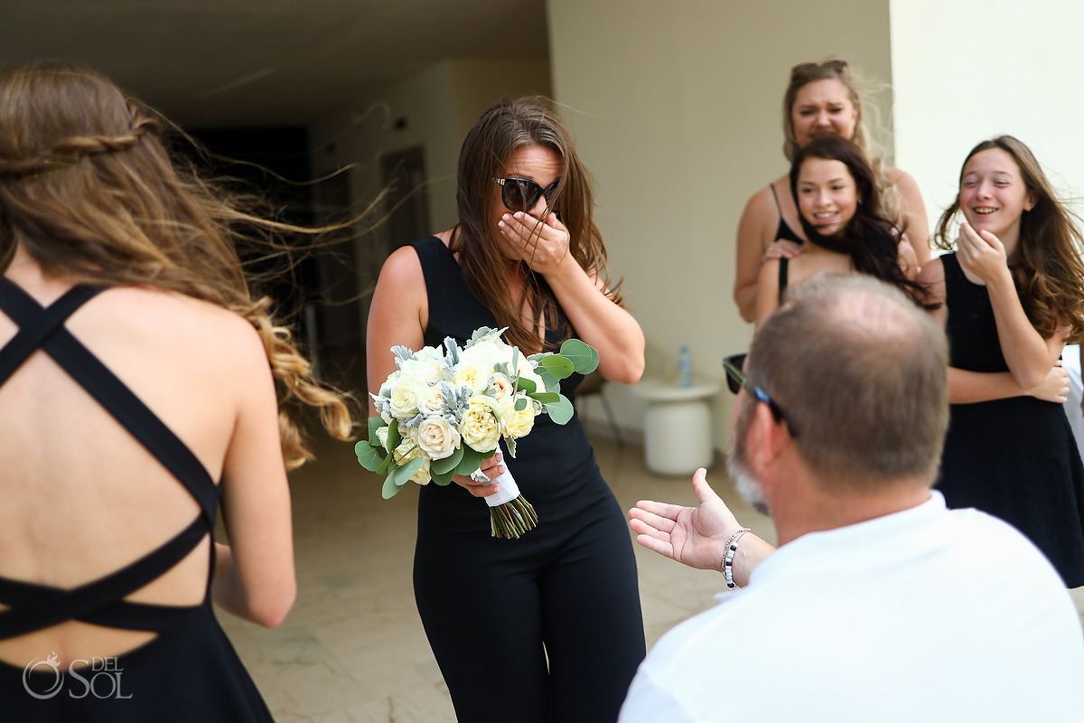 Surprise Proposal during wedding reception bouquet toss Dreams Natura Riviera Cancun Mexico