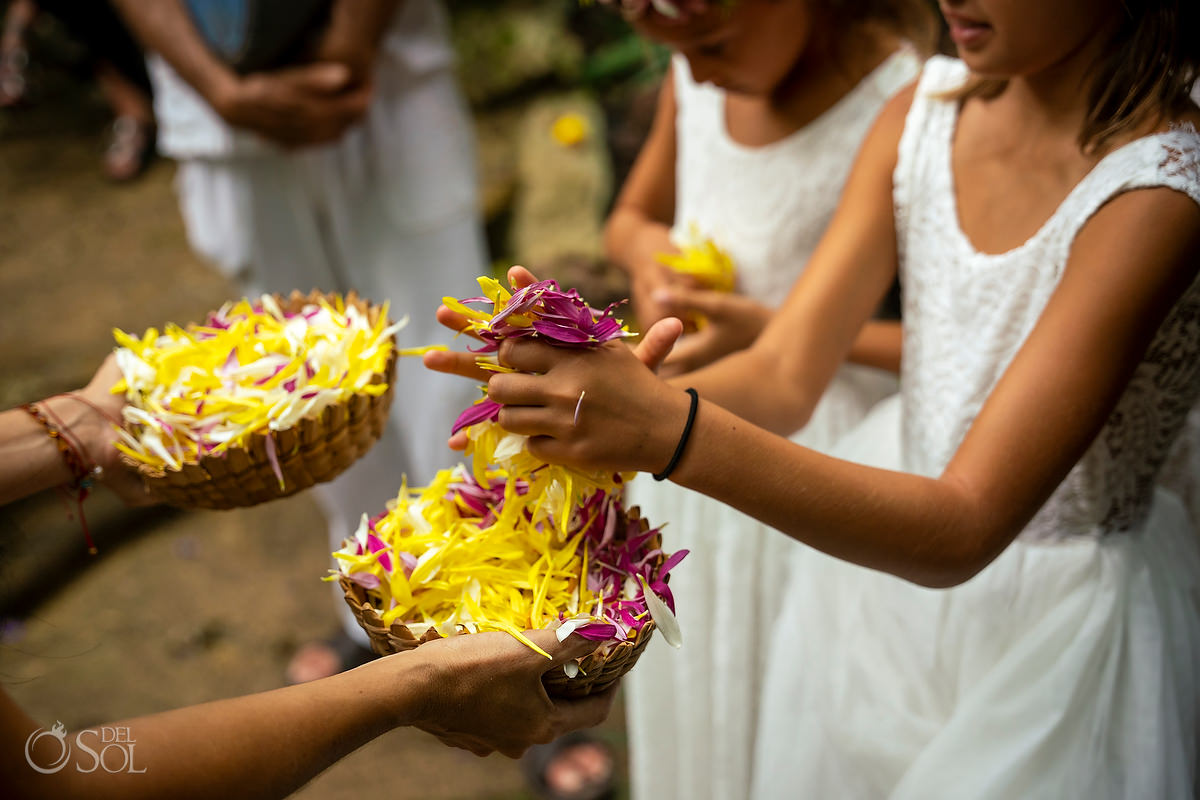 Who coordinates cenote ceremonies with flower petals