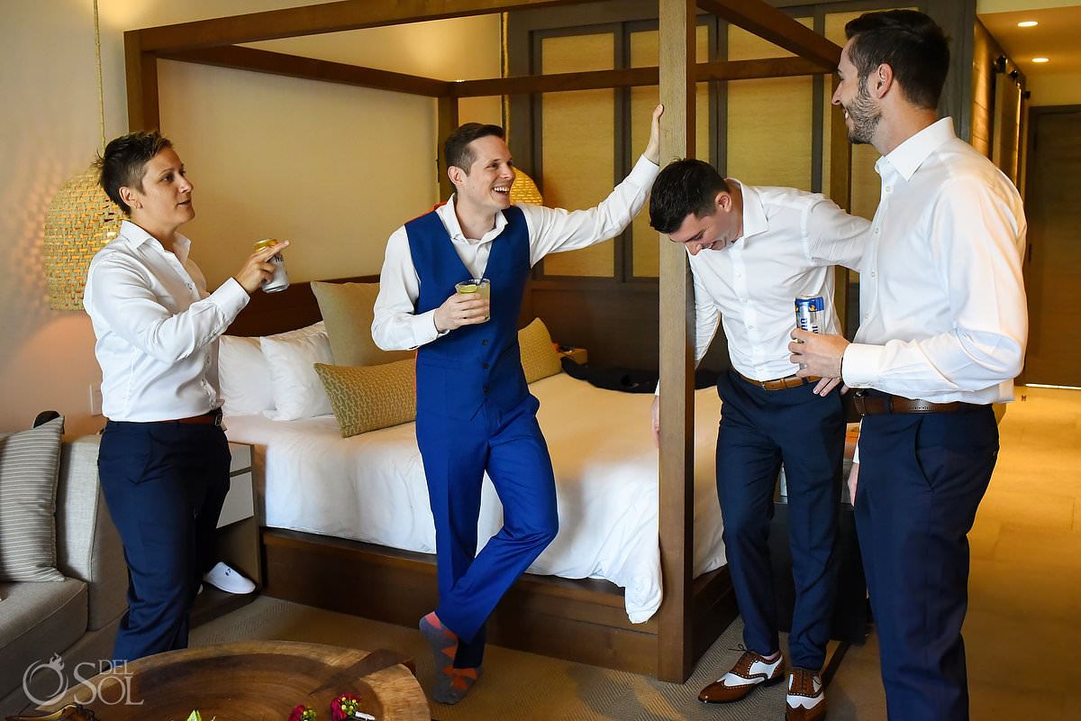 groom and groomsmen getting ready in unico suite