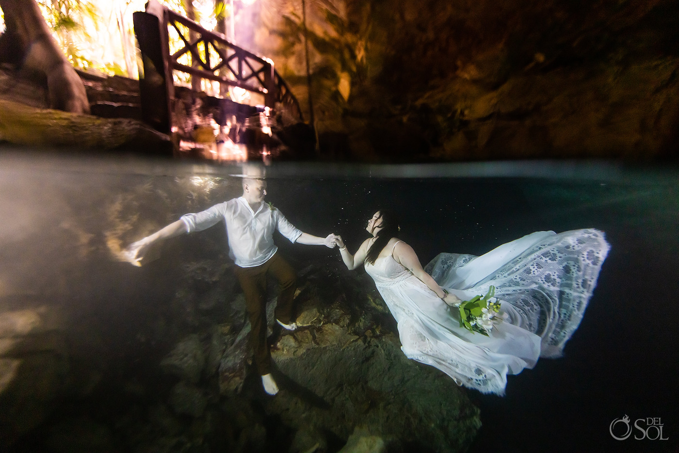 cenote trash the dress underwater bride and groom