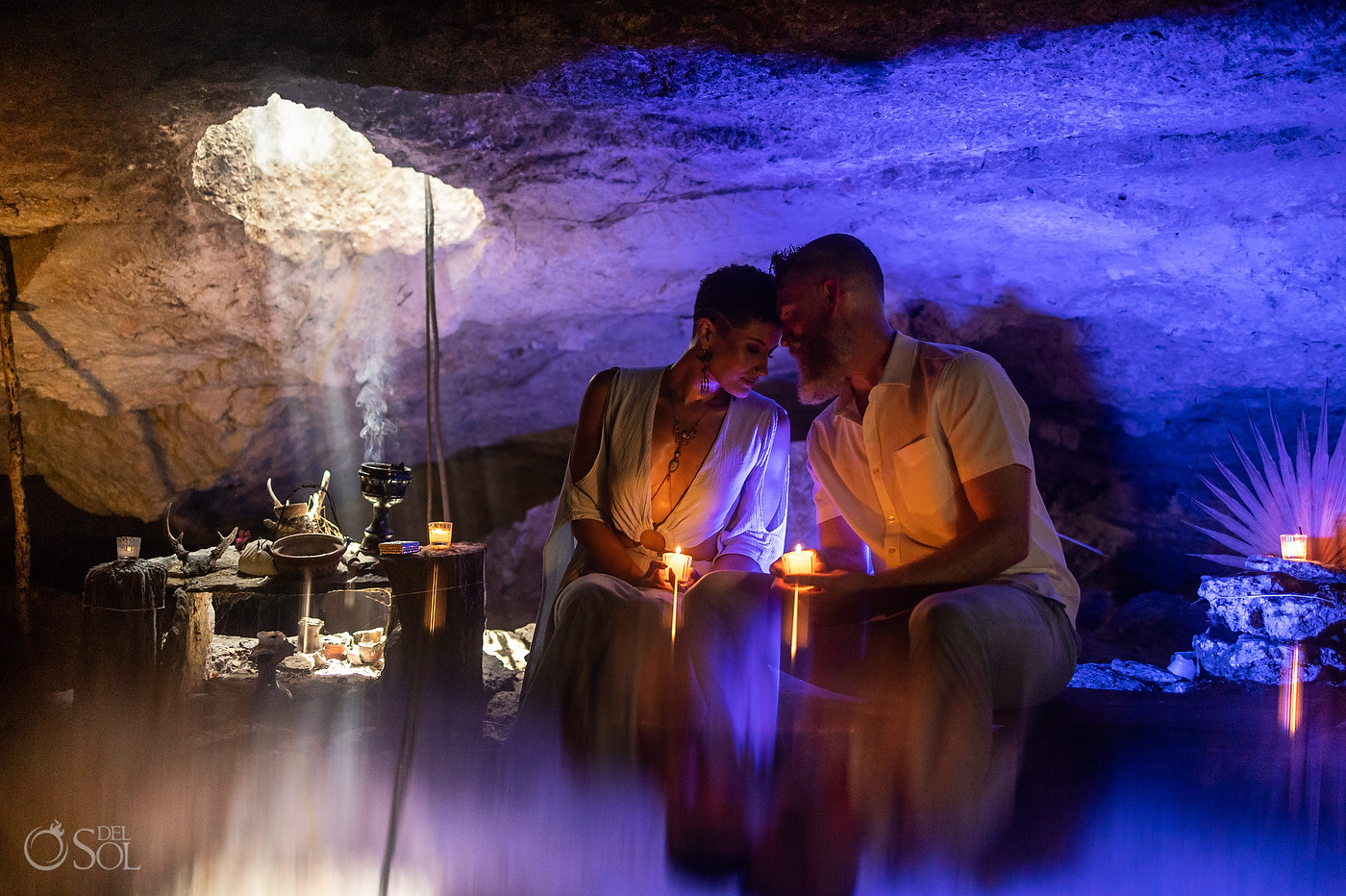 couple praying micro cenote ceremony experience by del Sol Photography