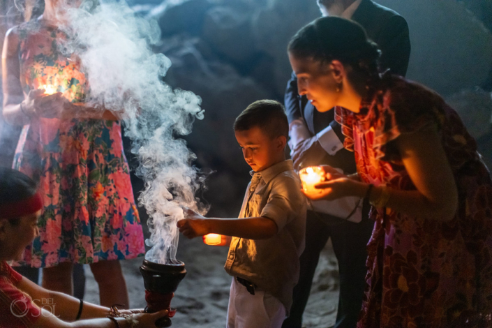 children lighting candles Underground cave Family Cenote Wedding Akumal Mexico