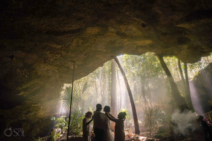 fabric wrapping blessing underground cave sacred Mayan spiritual blessing ceremony Mexico cenote wedding