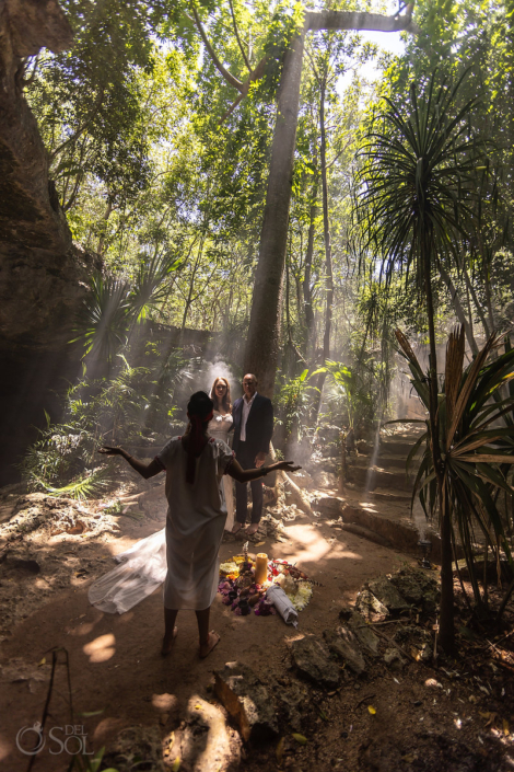 Shaman blessing bride and groom sacred Mayan tree the ceiba or yaxche ceremony Mexico cenote wedding