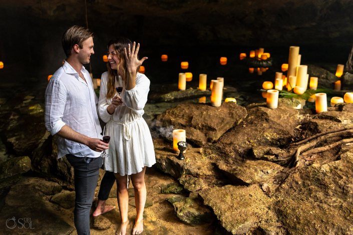 she said yes Guy surprises his girlfriend in Mexico with a romantic Tulum Cenote Proposal by del Sol Photography in the jungle underground.