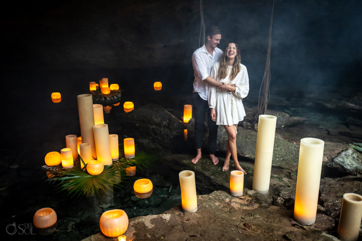 Guy surprises his girlfriend in Mexico with a romantic Tulum Cenote Proposal by del Sol Photography in the jungle underground.