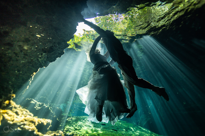 I love how your photos play with rays of light, reflection, and the best of both above the water greenery and below the water weightlessness