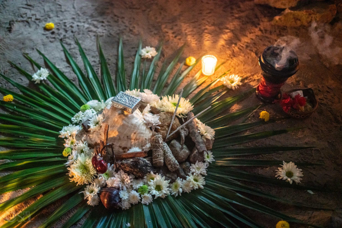 special flower altar with candles for a Romantic family cenote wedding