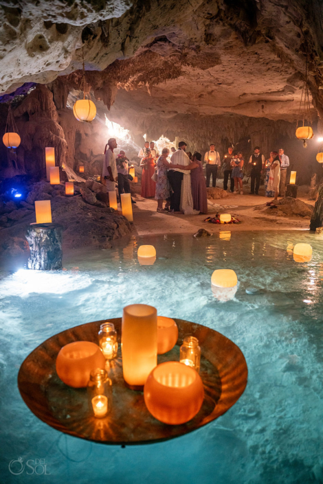 Floating candles in a Family Cenote Ceremony in Mexico with a shaman and 20 guests