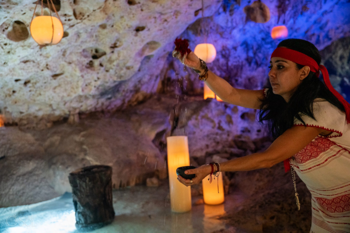 Floating candles in a Family Cenote Ceremony in Mexico with a shaman and 20 guests