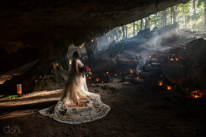 bride posing in a cenote wedding in mexico