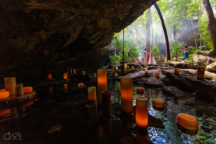 Candle installation in the water for Tulum cenote Jungle Mayan ceremony