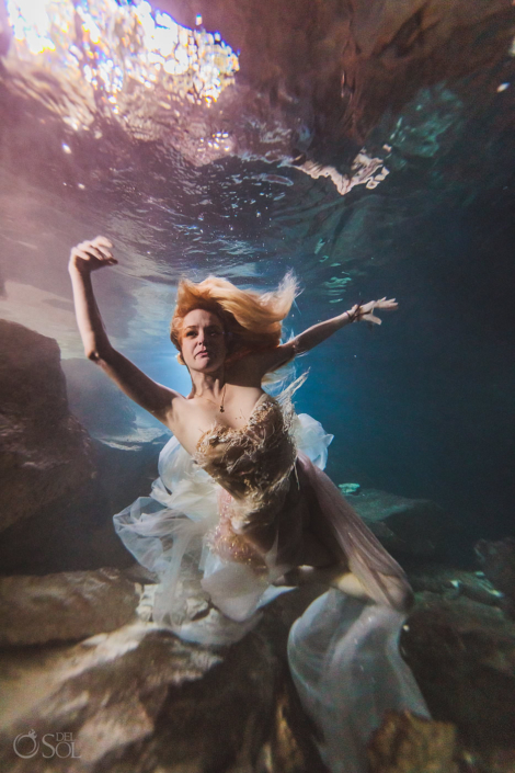 unique bride portrait underwater trash the dress wedding photography Tulum Jungle Cenote