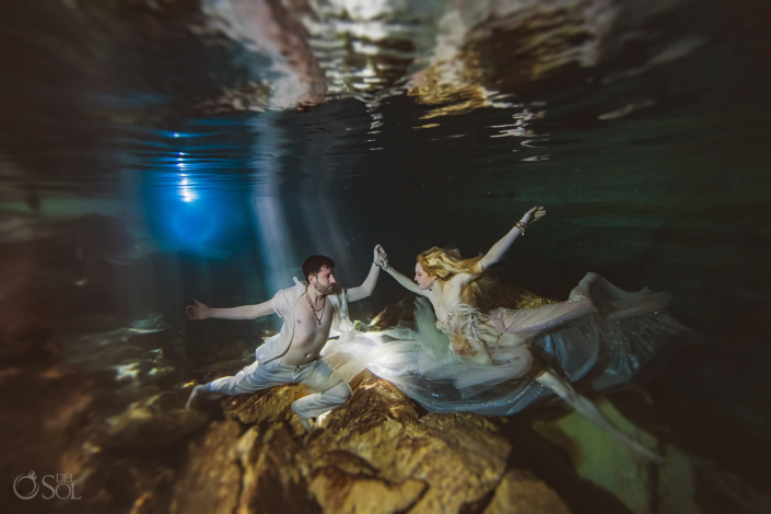 artistic underwater trash the dress wedding photography Tulum Jungle Cenote Mexico