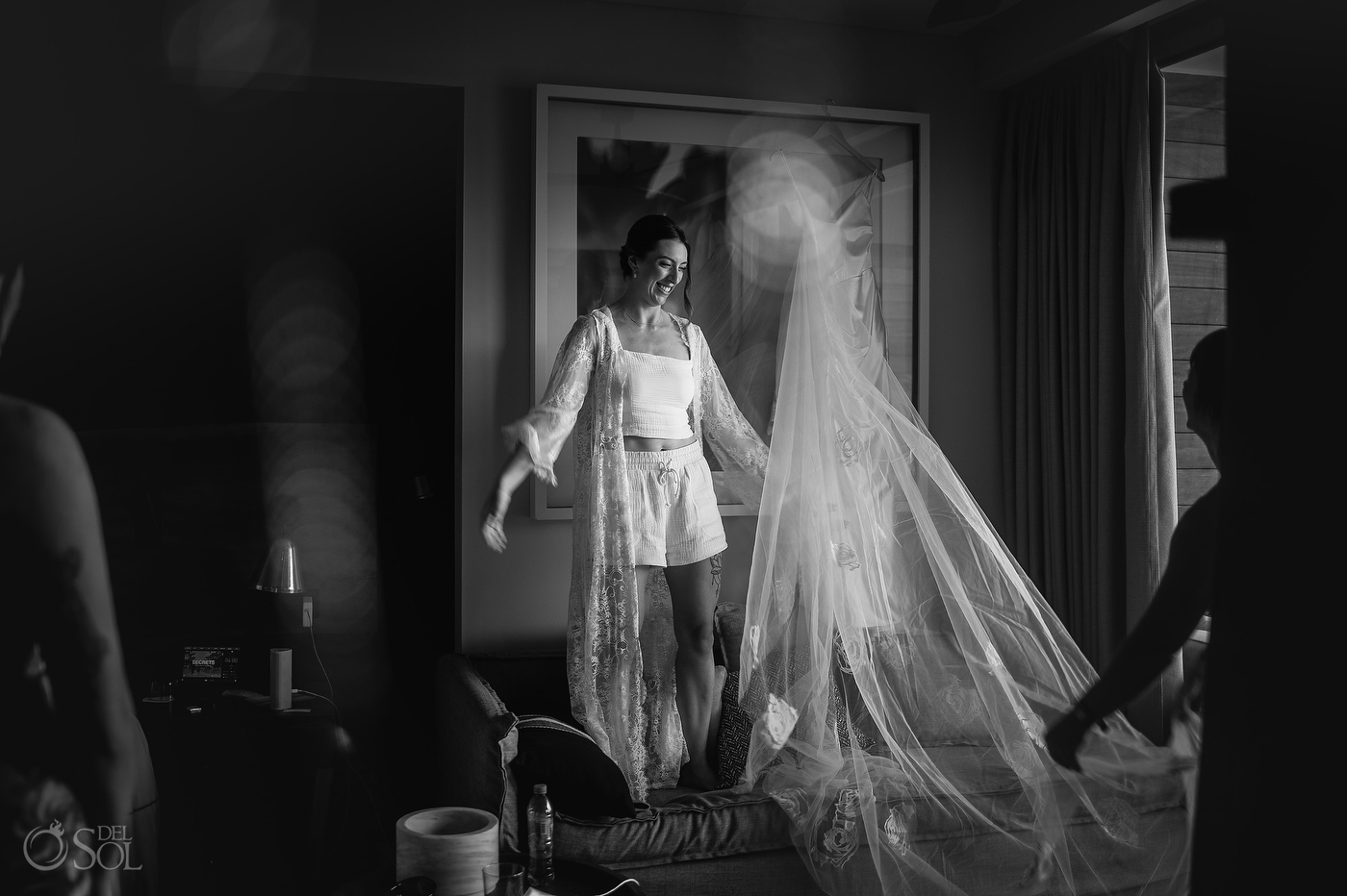 Black and white wedding photo of bride getting ready at her Secrets Moxche Wedding