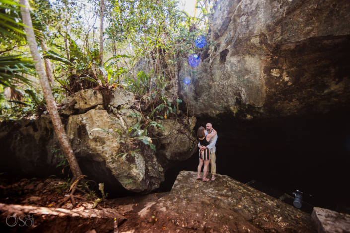 couple embrace in a romantic portrait during a cenote Tour Puerto Aventuras Mexico