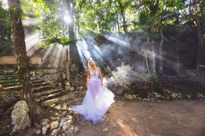 Bride on anniversary cenote vow renewal ceremony