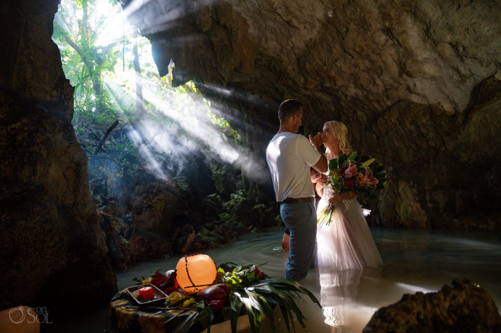 Romantic vow renewal cenote ceremony