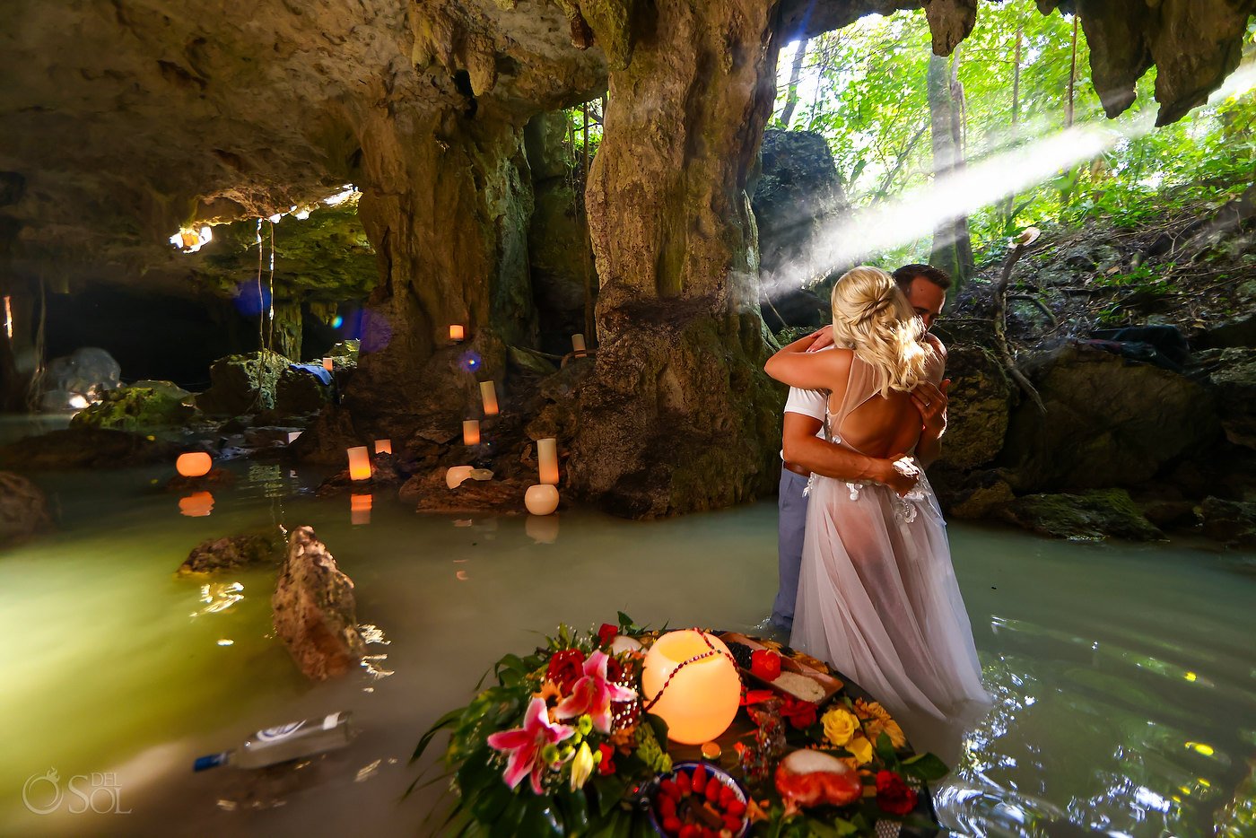 Romantic vow renewal cenote ceremony