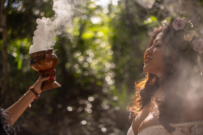 Bride sharing a quiet moment during a micro wedding cenote ceremony in paradise