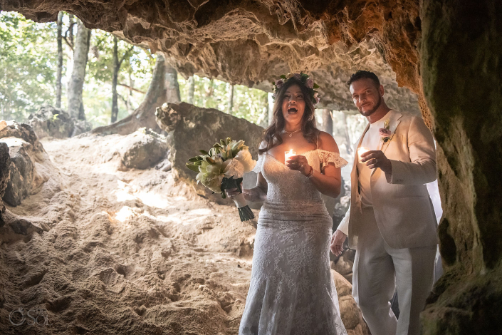 Couple sharing a quiet moment during a micro wedding cenote ceremony in paradise