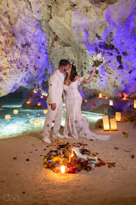 Intimate micro wedding cenote ceremony with a couple exchanging vows in the Riviera Maya