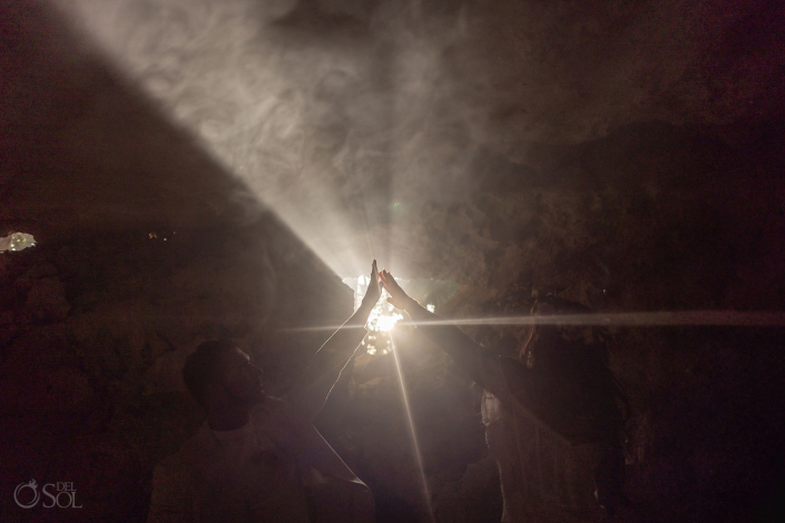 Riviera Maya Micro Wedding Cenote ceremony – JA Bride and groom sharing a private moment during an intimate cenote wedding ceremony