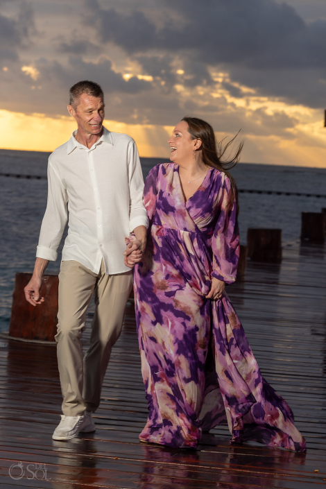 Couple walking together after a vow renewal ceremony in Mexico
