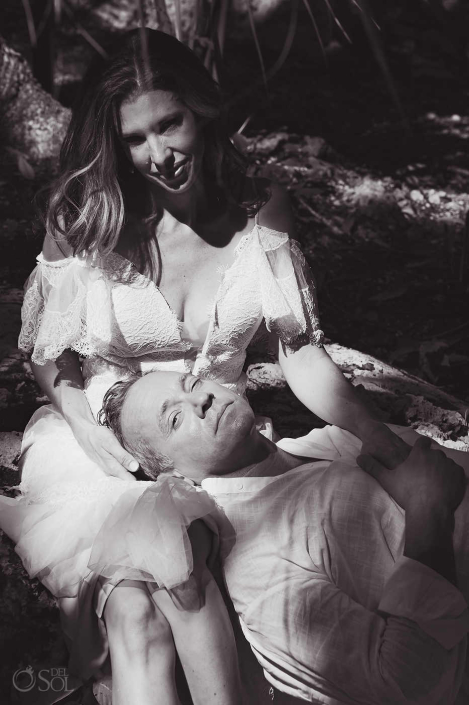 Couple sharing a grounding moment during a cenote session experience