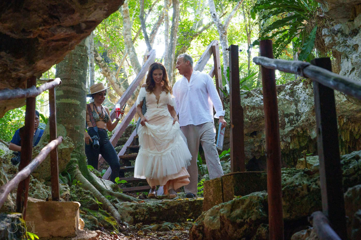 Natural cave formations framing a couple photography experience