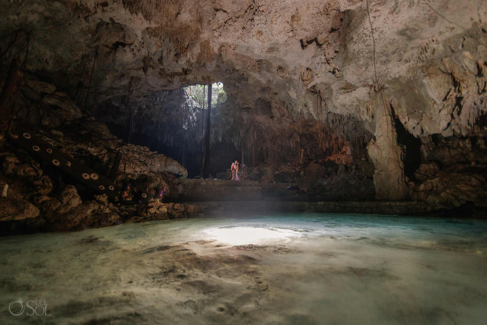 Cenote cave interior creating a cathedral-like setting for a couple session