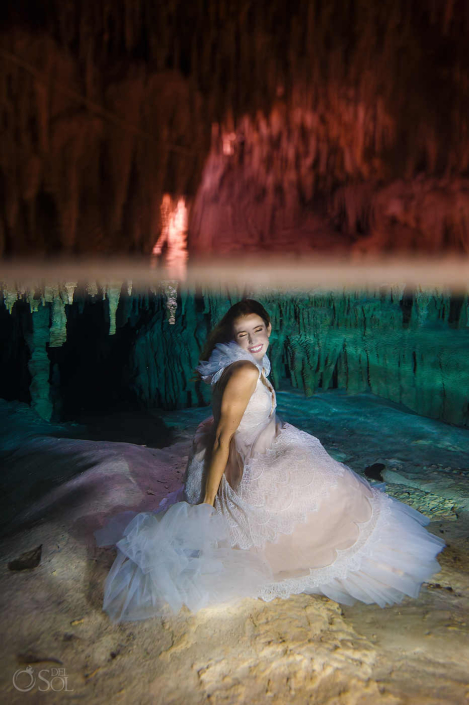 Artistic underwater cenote experience focused on connection and meaning and beautiful bride