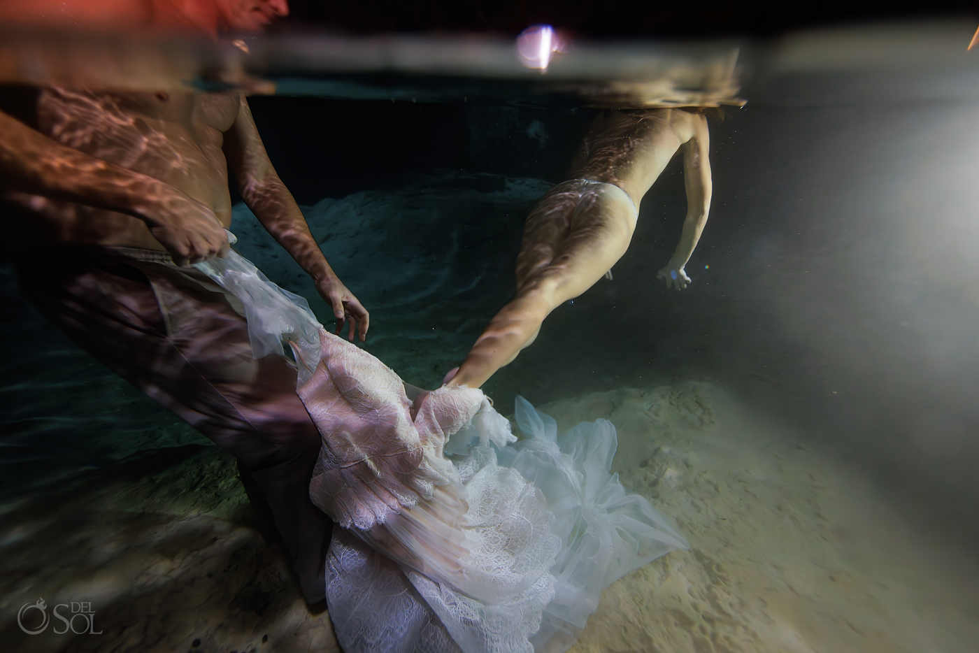 Underwater Trash the Dress Cenote Session Subtle Adam and Eve underwater cenote session focused on connection and form