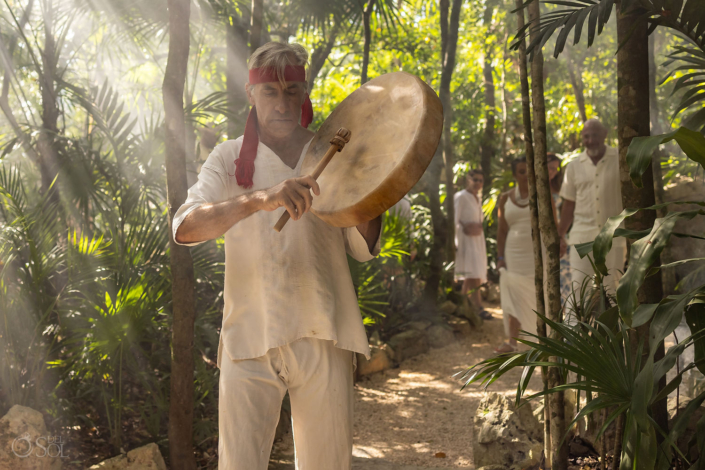 Traditional drum ceremony in the jungle before a spiritual cenote vow renewal