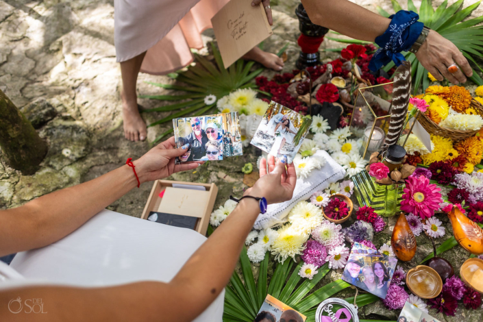 family photos and their wedding photo, Personal memories incorporated into a spiritual vow renewal ritual
