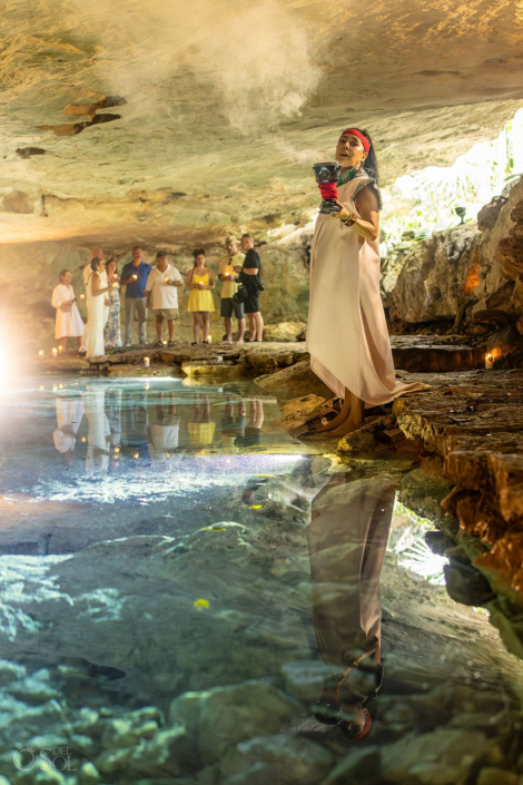 Spiritual cenote vow renewal ceremony inside a sacred cave setting in Riviera Maya Mexico