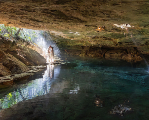 Copal smoke drifting through the jungle during a spiritual cenote vow renewal ceremony