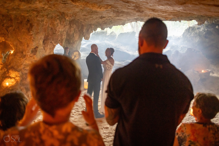 Sacred copal smoke surrounding family during a spiritual wedding ceremony.