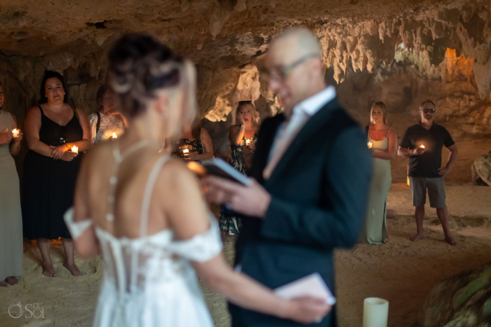 Groom reading an emotional letter from the bride’s mother during the ceremony.