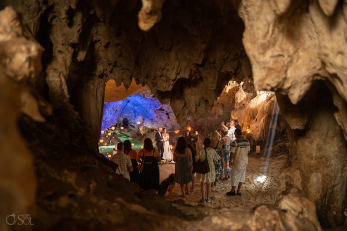 Massive limestone cave transformed into a natural cathedral for a cenote wedding ceremony.