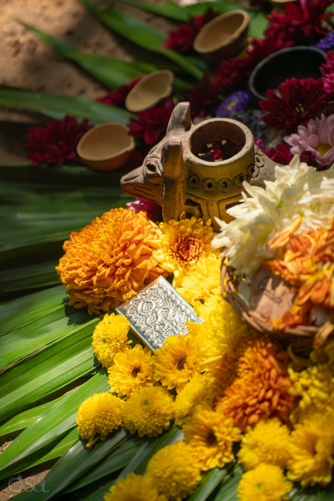 Handmade floral ceremony altar prepared for a cenote wedding.