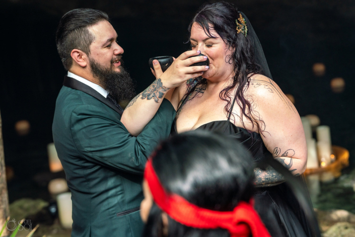 Couple celebrates inside a natural cave during a Riviera Maya cenote wedding