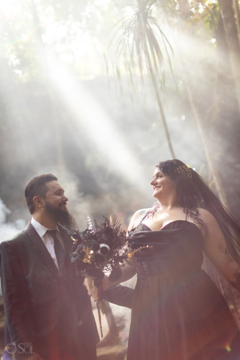 Groom embraces bride during an intimate portrait session.