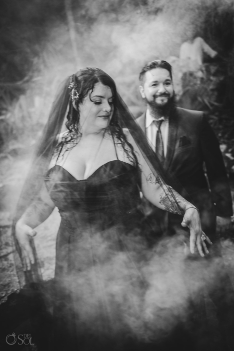 Romantic and moody black and white portrait inside a Mexican cenote.